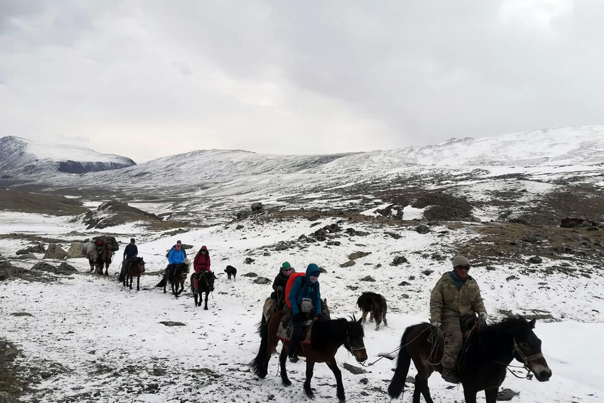 Horse riding through the winter